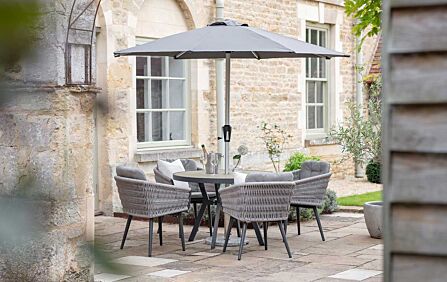 Bramblecrest Mauritius 4 Seat Round Dining Set with Parasol & Base Bramblecrest Mauritius 4 Seat Round Dining Set with Parasol & Base