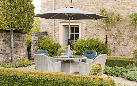 Bramblecrest Monterey 4 Seater Round Dining Set with Parasol - Grey Bramblecrest Monterey 4 Seater Round Dining Set with Parasol - Grey