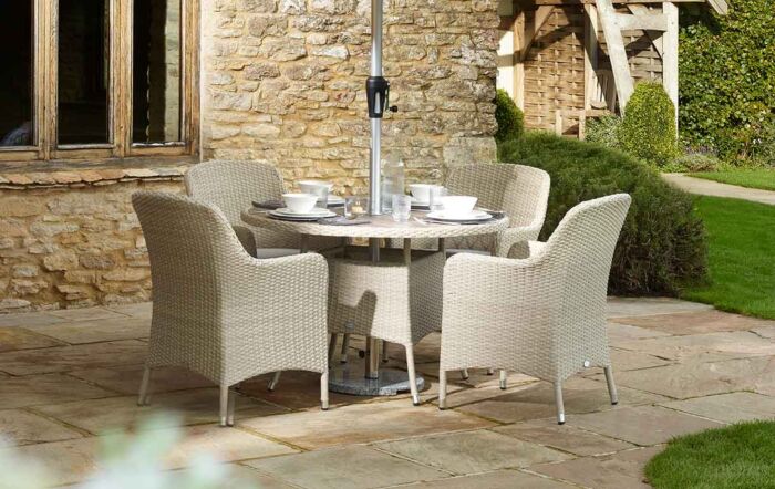 Bramblecrest Tetbury 4 Seater Round Dining Set with Parasol & Base - Nutmeg Bramblecrest Tetbury 4 Seater Round Dining Set with Parasol & Base - Nutmeg