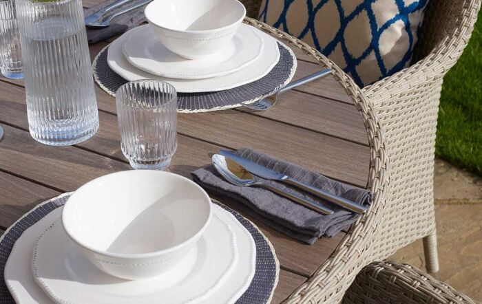 Bramblecrest Tetbury Tree Free Six Seat Round Dining Set with Parasol - Cloud Bramblecrest Tetbury Tree Free Six Seat Round Dining Set with Parasol - Cloud